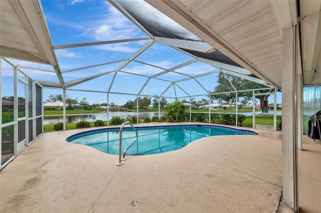 view of pool with a lanai, a patio area, and a water view