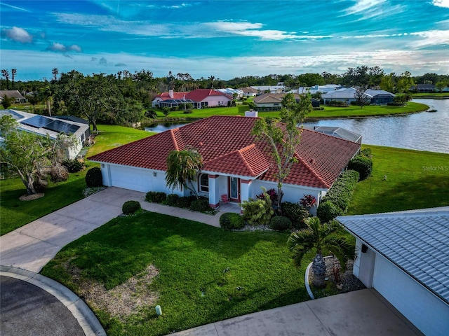 birds eye view of property featuring a water view