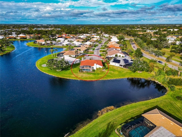 bird's eye view with a water view