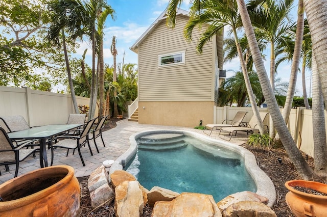 view of pool featuring a patio area