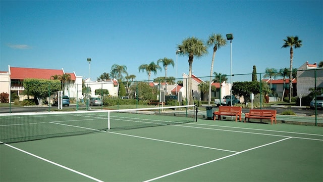 view of tennis court with basketball court