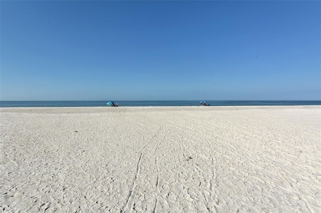 property view of water featuring a view of the beach