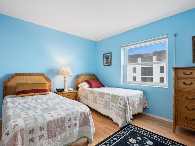 bedroom featuring light hardwood / wood-style floors