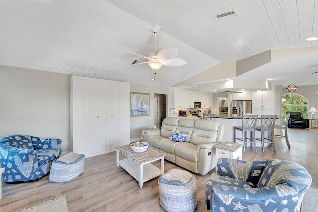 living room with ceiling fan, lofted ceiling, wood ceiling, and light hardwood / wood-style flooring