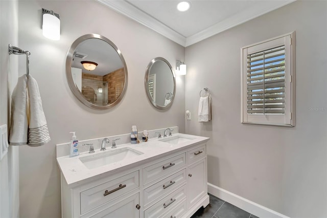 bathroom with tile patterned floors, vanity, and ornamental molding