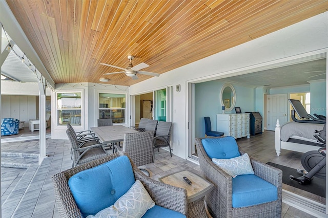 view of patio featuring ceiling fan