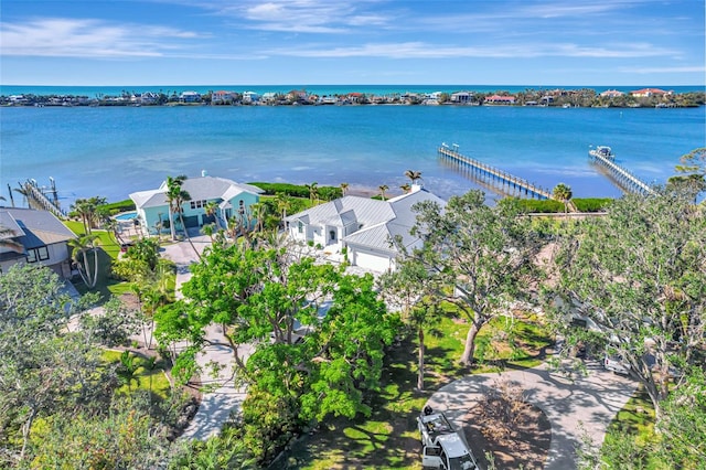 birds eye view of property featuring a water view