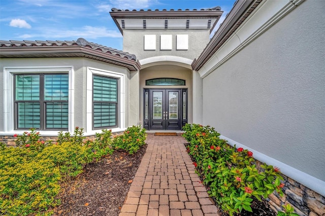 doorway to property with french doors