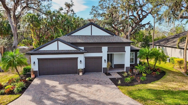 view of front of home with a garage