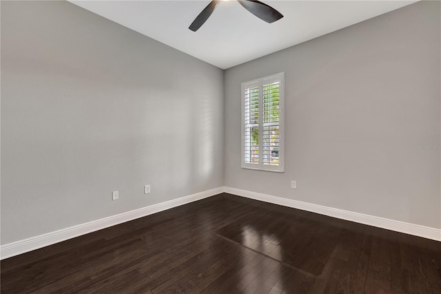 empty room featuring ceiling fan and hardwood / wood-style floors