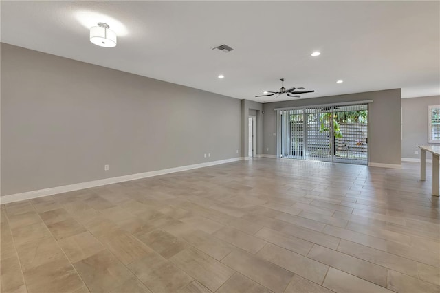 unfurnished room with ceiling fan