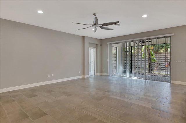 spare room featuring ceiling fan