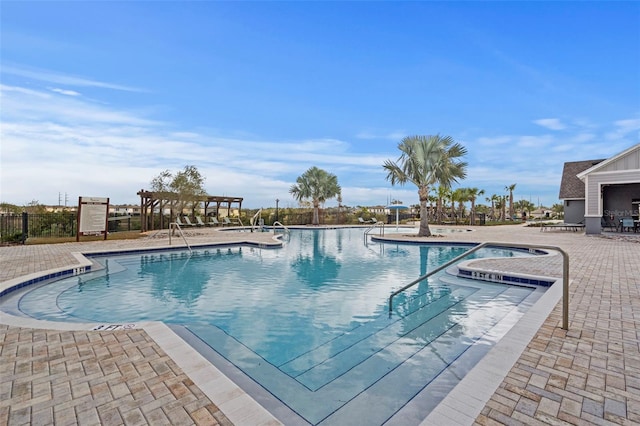 view of swimming pool featuring a patio