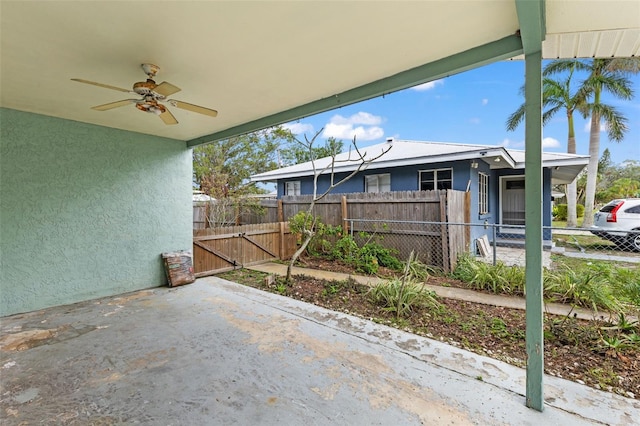 view of patio / terrace featuring ceiling fan