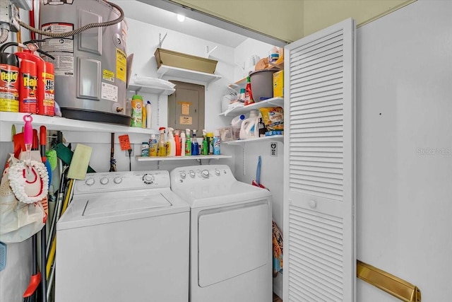 laundry room featuring washing machine and clothes dryer