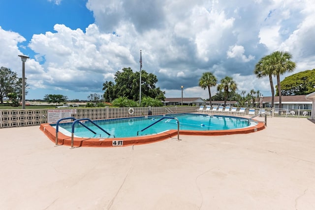 view of pool with a patio