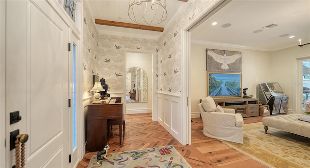 foyer entrance featuring crown molding, beam ceiling, and light parquet floors