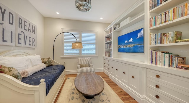 sitting room featuring light wood-type flooring