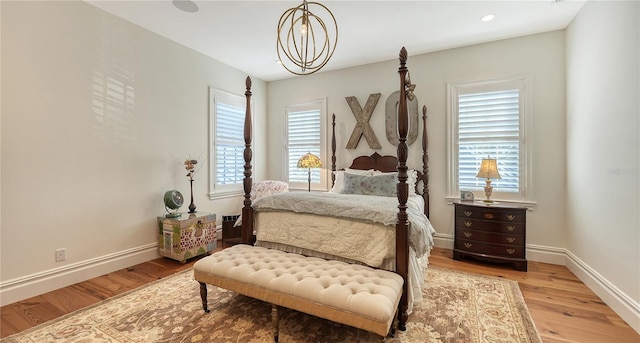 bedroom featuring wood-type flooring