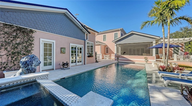 view of pool featuring a patio and a pergola