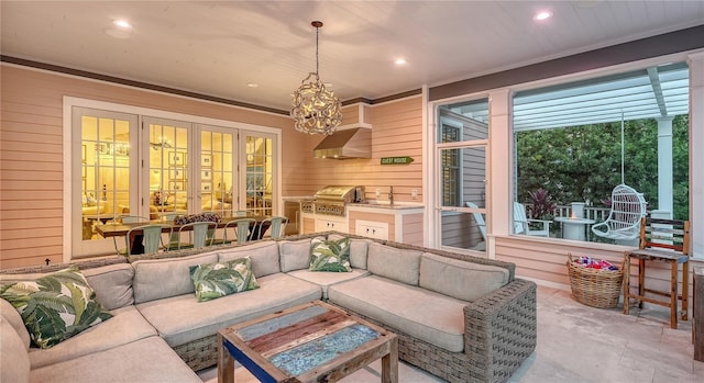 interior space with area for grilling, outdoor lounge area, and french doors