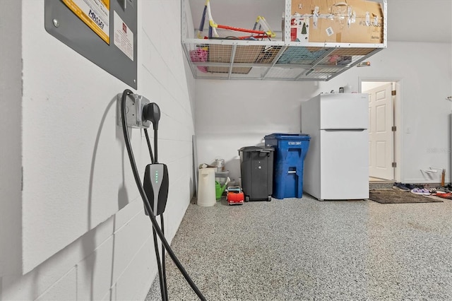 garage featuring white refrigerator