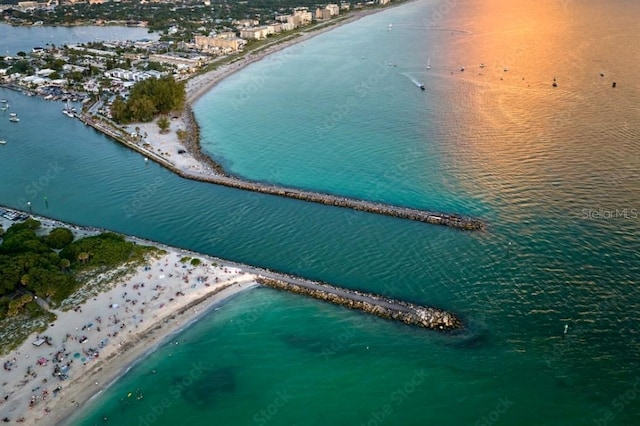 aerial view featuring a water view and a view of the beach