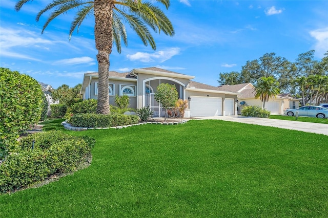 ranch-style home with a front yard and a garage