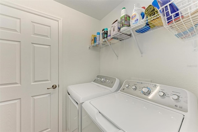 laundry area featuring washing machine and dryer