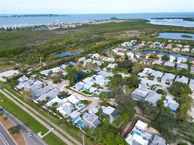 bird's eye view with a water view