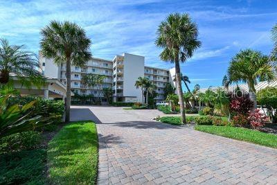 view of community featuring decorative driveway