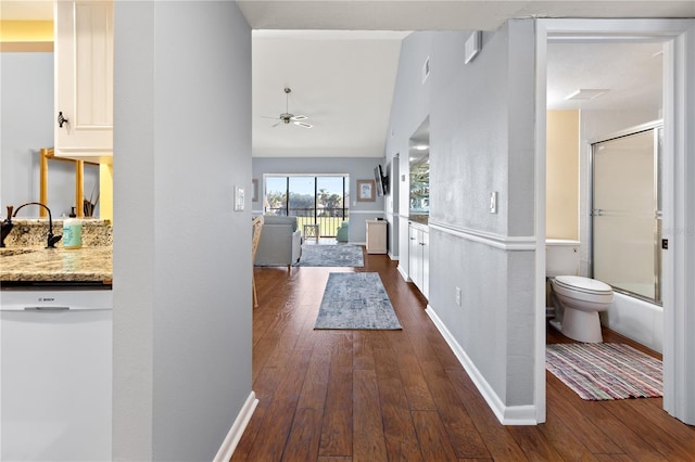 hall with sink and dark hardwood / wood-style floors