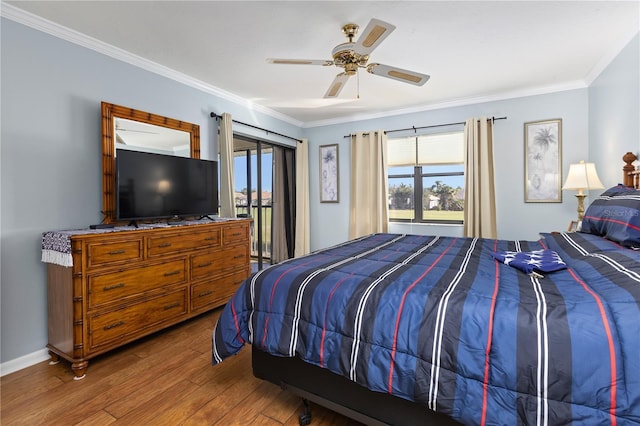 bedroom featuring hardwood / wood-style flooring, ceiling fan, crown molding, and access to outside