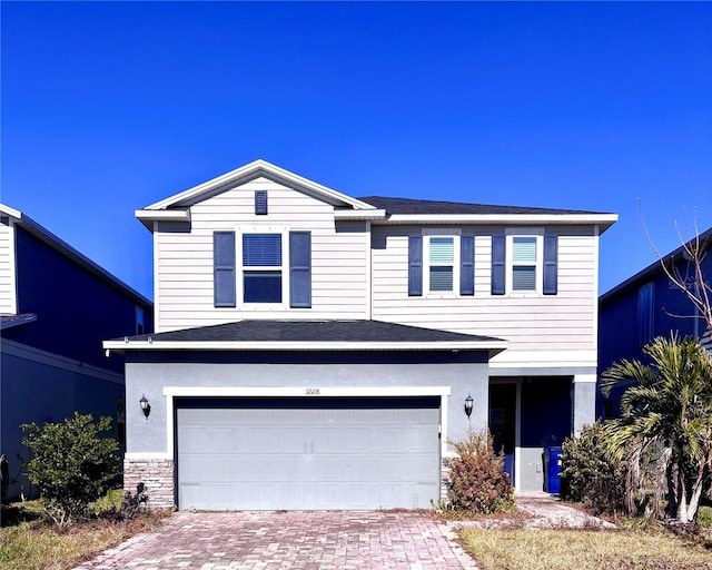 front of property featuring a garage