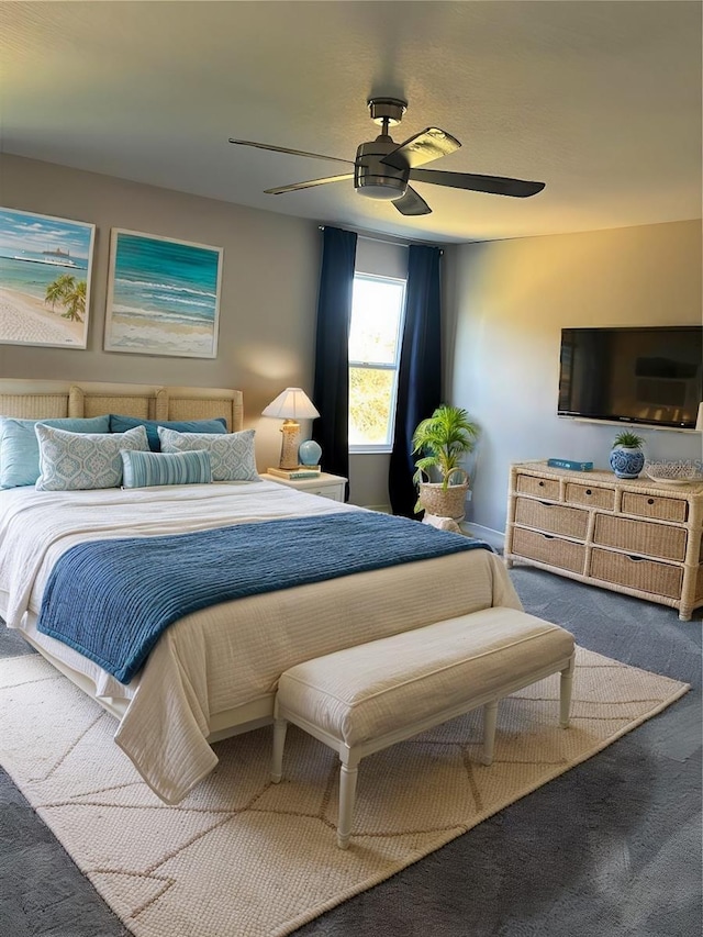 carpeted bedroom with ceiling fan