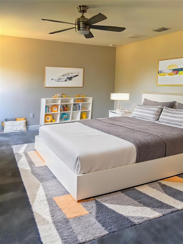 bedroom featuring ceiling fan and carpet flooring