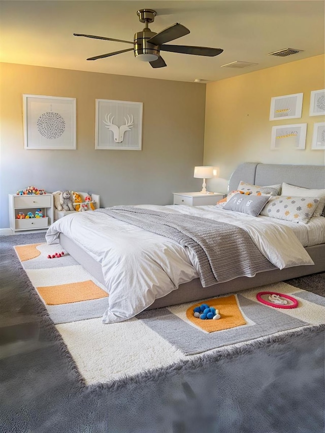 carpeted bedroom with ceiling fan