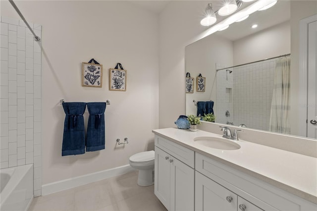 bathroom featuring toilet, vanity, and tile patterned floors