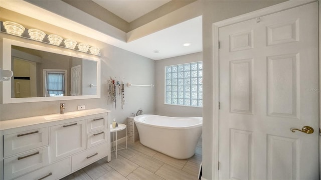 bathroom featuring a bathtub and vanity