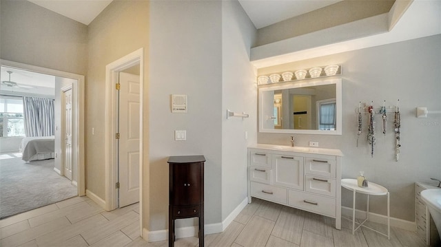 bathroom featuring vanity and ceiling fan