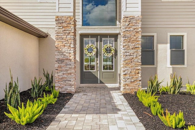 doorway to property featuring french doors