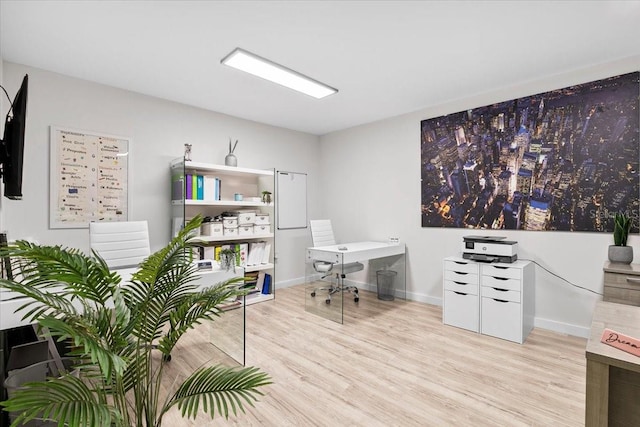 home office featuring light hardwood / wood-style flooring