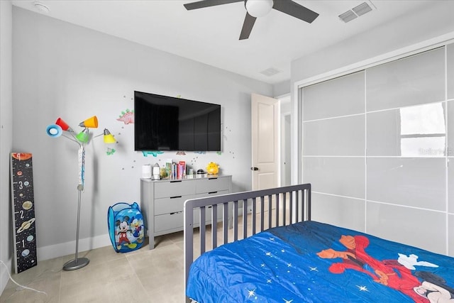 bedroom featuring ceiling fan and light tile patterned flooring