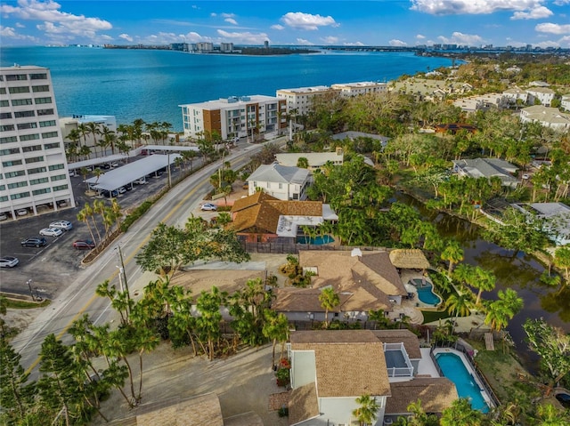 bird's eye view with a water view