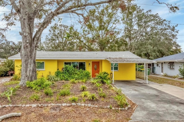 single story home with a carport