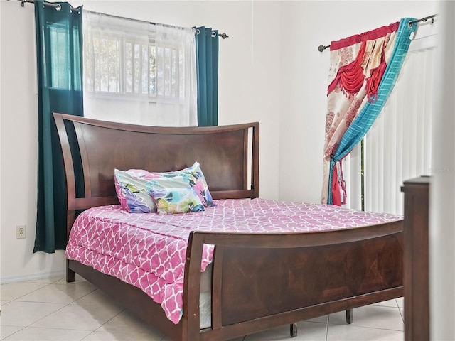 bedroom with tile patterned floors