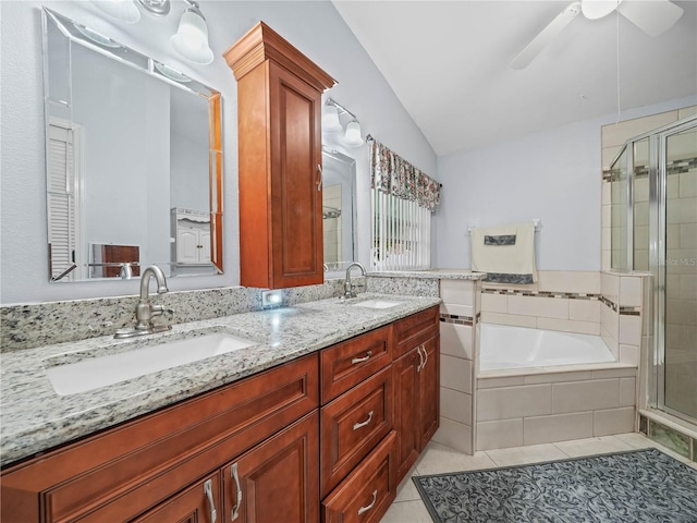 bathroom featuring ceiling fan, tile patterned floors, vaulted ceiling, shower with separate bathtub, and vanity