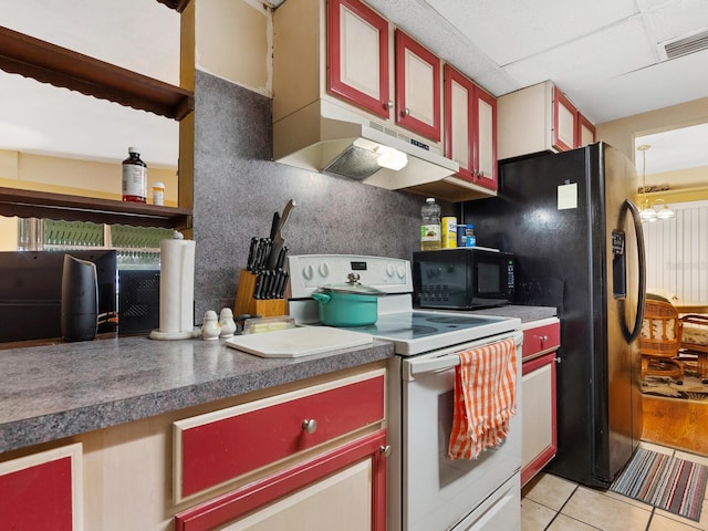 kitchen with white electric range, a drop ceiling, and light tile patterned floors