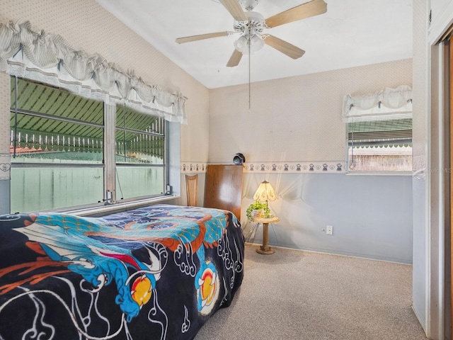 bedroom featuring carpet floors and a ceiling fan