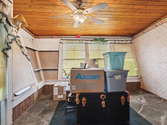 interior space featuring ceiling fan